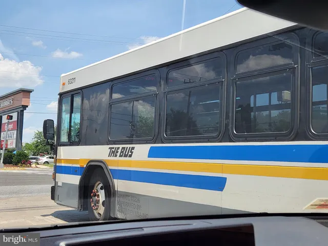a view of street with parked cars