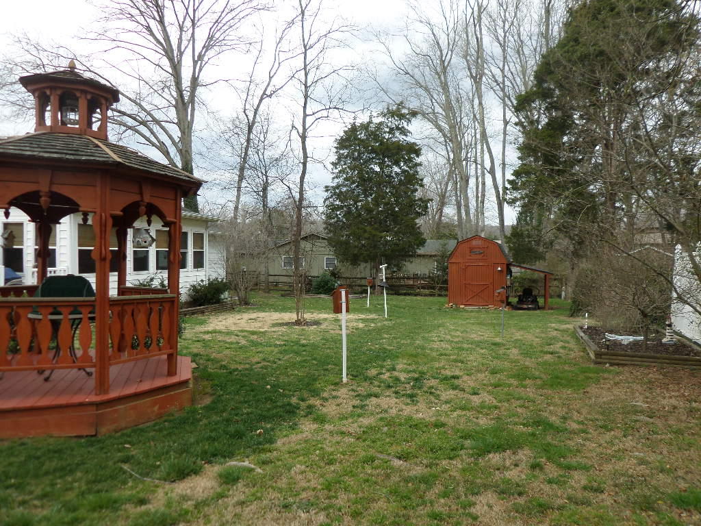 107 Colgate Road Oak Ridge, TN 37830 - Photo 29 of 32 Back with gazebo and shed