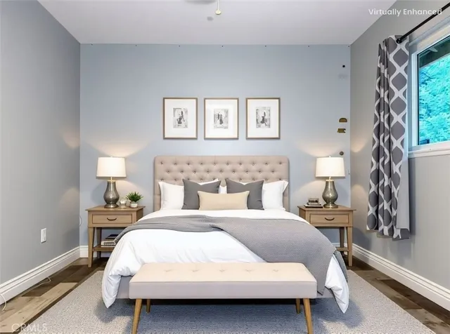 a kitchen with a sink a counter appliances and cabinets