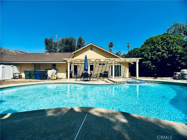 a view of a patio with wooden floor