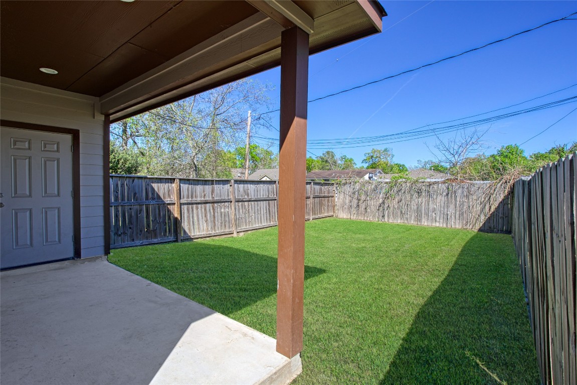 9306 Bean Street, Unit B Houston, TX 77028 - Photo 3 of 15 a view of a backyard with a garden