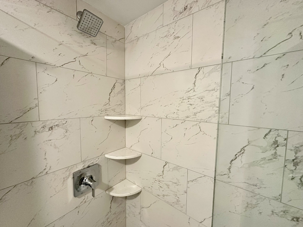 64 North Margin Street, Unit 4R Boston, MA 02113 - Photo 17 of 18 a bathroom with a shower