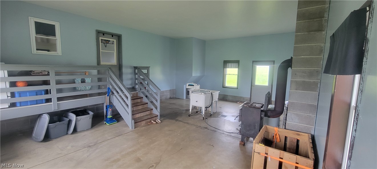 15560 Burton-Windsor Road Middlefield, OH 44062 - Photo 36 of 45 wash room with heater and area for everything