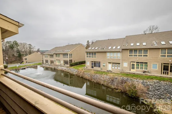 a view of a house with a swimming pool