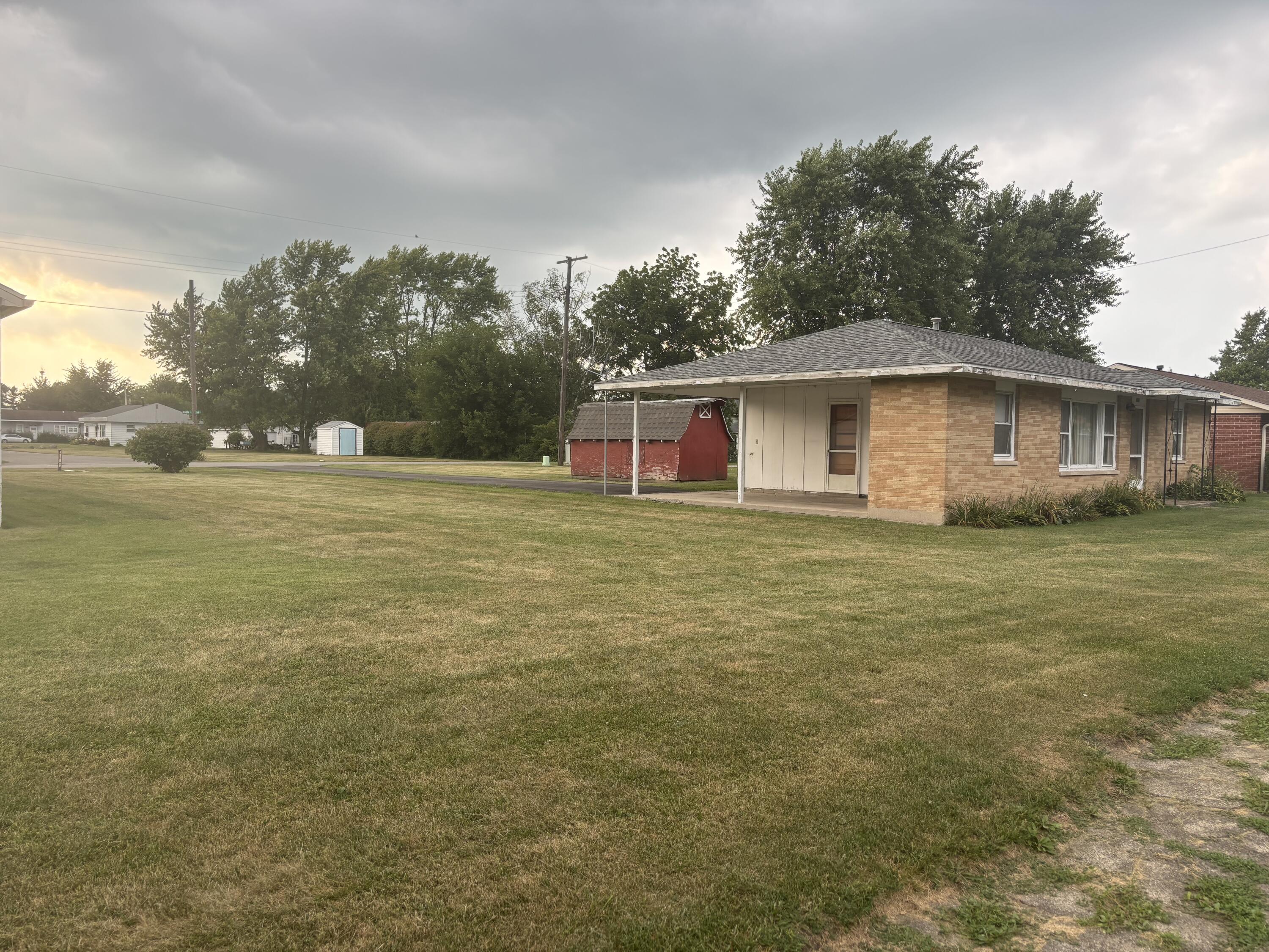 606 North Race Street Monon, IN 47959 - Photo 11 of 14 a view of a house with a big yard