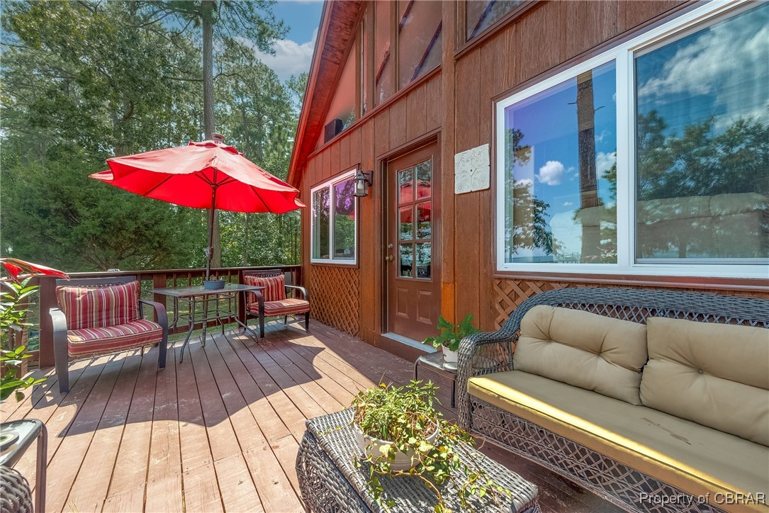 5447 Mobjack Road Gloucester, VA 23061 - Photo 24 of 40 Deck featuring outdoor lounge area