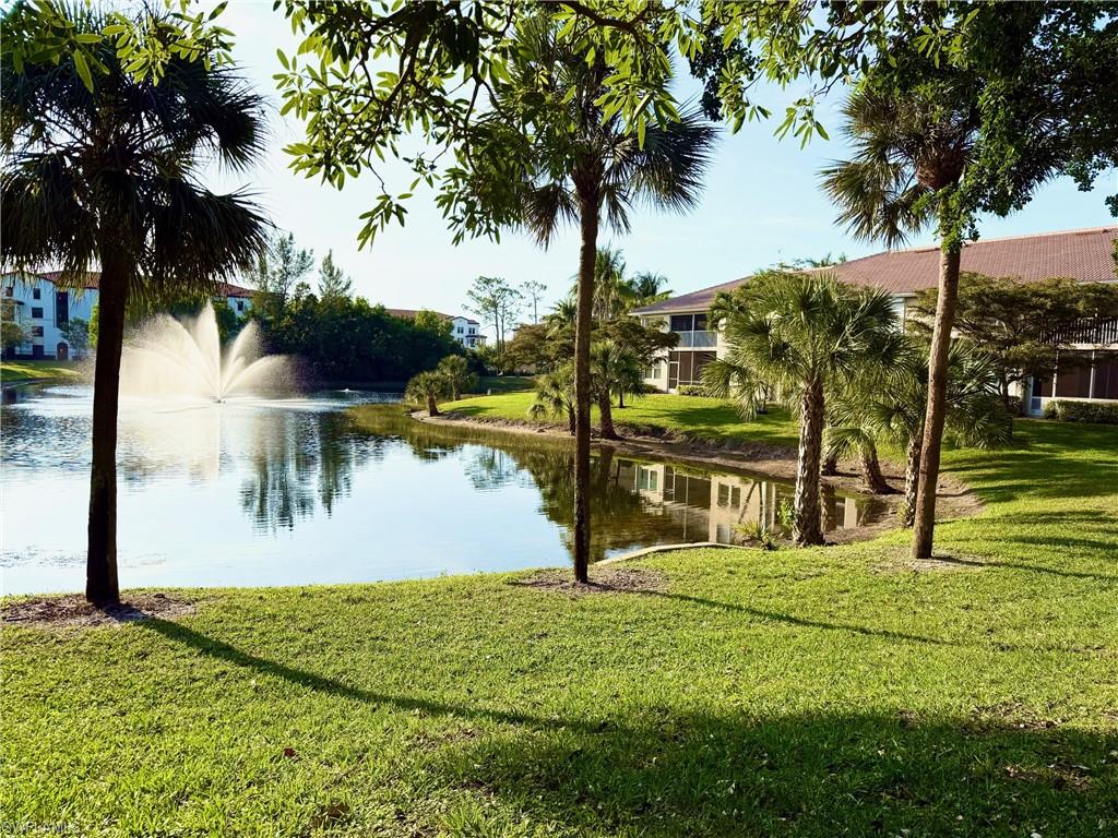 348 Dover Place, Unit C103 Naples, FL 34104 - Photo 1 of 27 a view of swimming pool