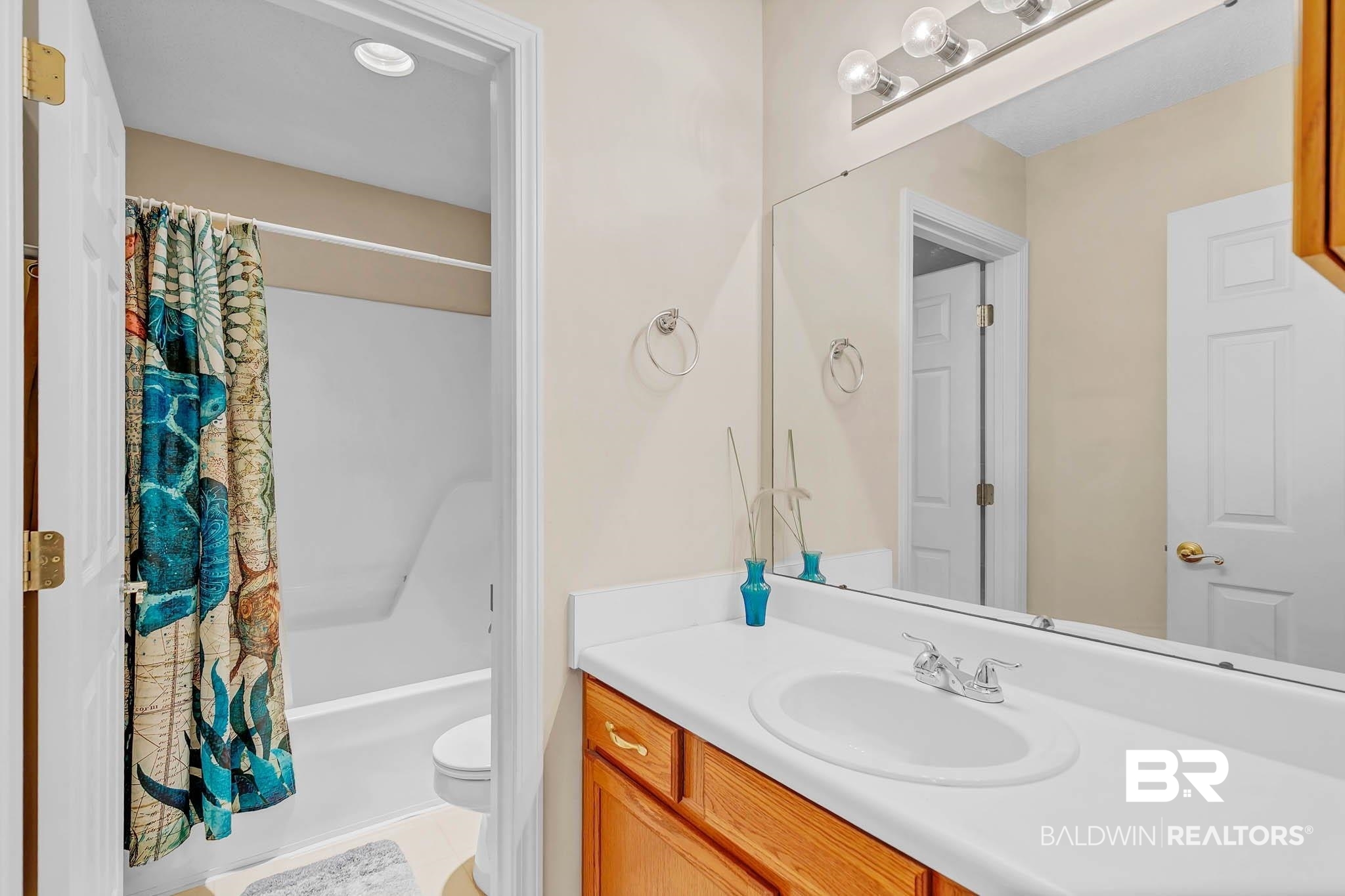 13072 Labradors Run Foley, AL 36535 - Photo 22 of 31 Full bathroom featuring vanity and shower / bath combo with shower curtain