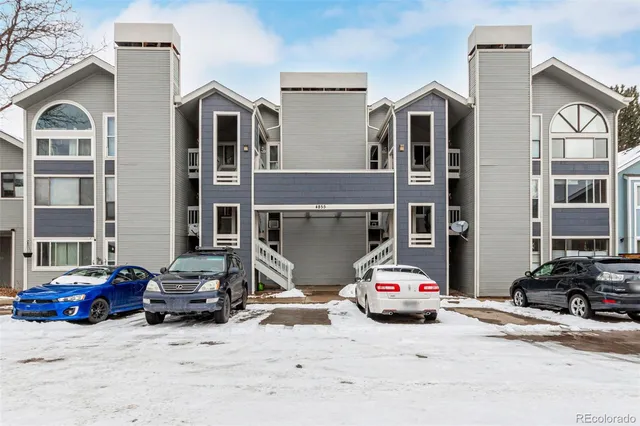 a car parked in front of a building