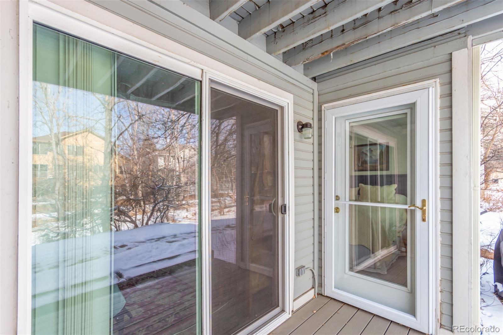 4855 Edison Avenue, Unit 112 Boulder, CO 80301 - Photo 16 of 20 a view of a door and wooden floor