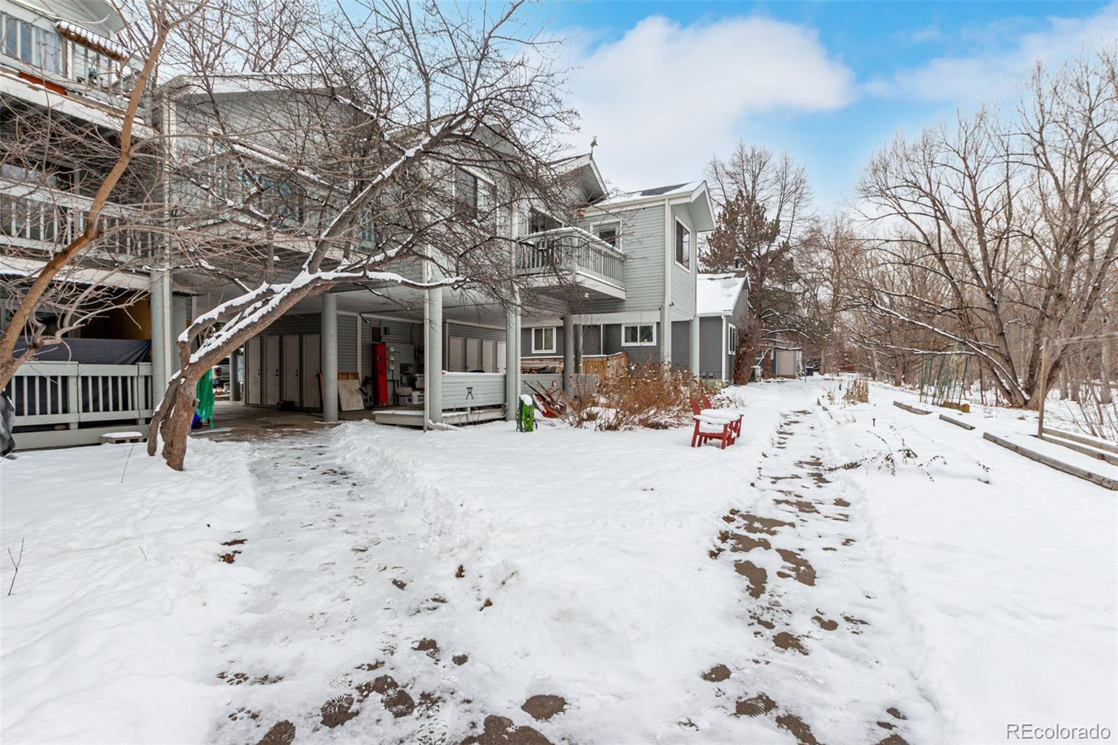 4855 Edison Avenue, Unit 112 Boulder, CO 80301 - Photo 18 of 20 a view of a road with snow on the road