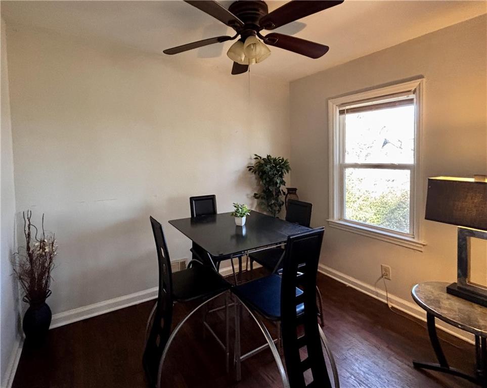 269 Florida Avenue Southwest Atlanta, GA 30310 - Photo 6 of 11 a dining room with furniture and window