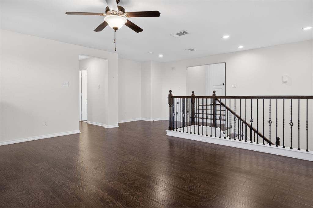 8728 Maple Ridge Trail Fort Worth, TX 76244 - Photo 26 of 40 Spacious room featuring wood-finish flooring, white walls, and recessed lighting
