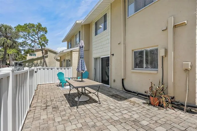 a building outdoor space with a car parked