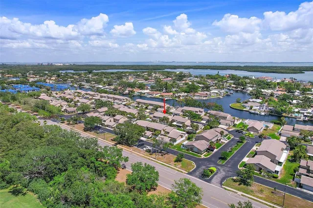 an aerial view of residential building and lake view