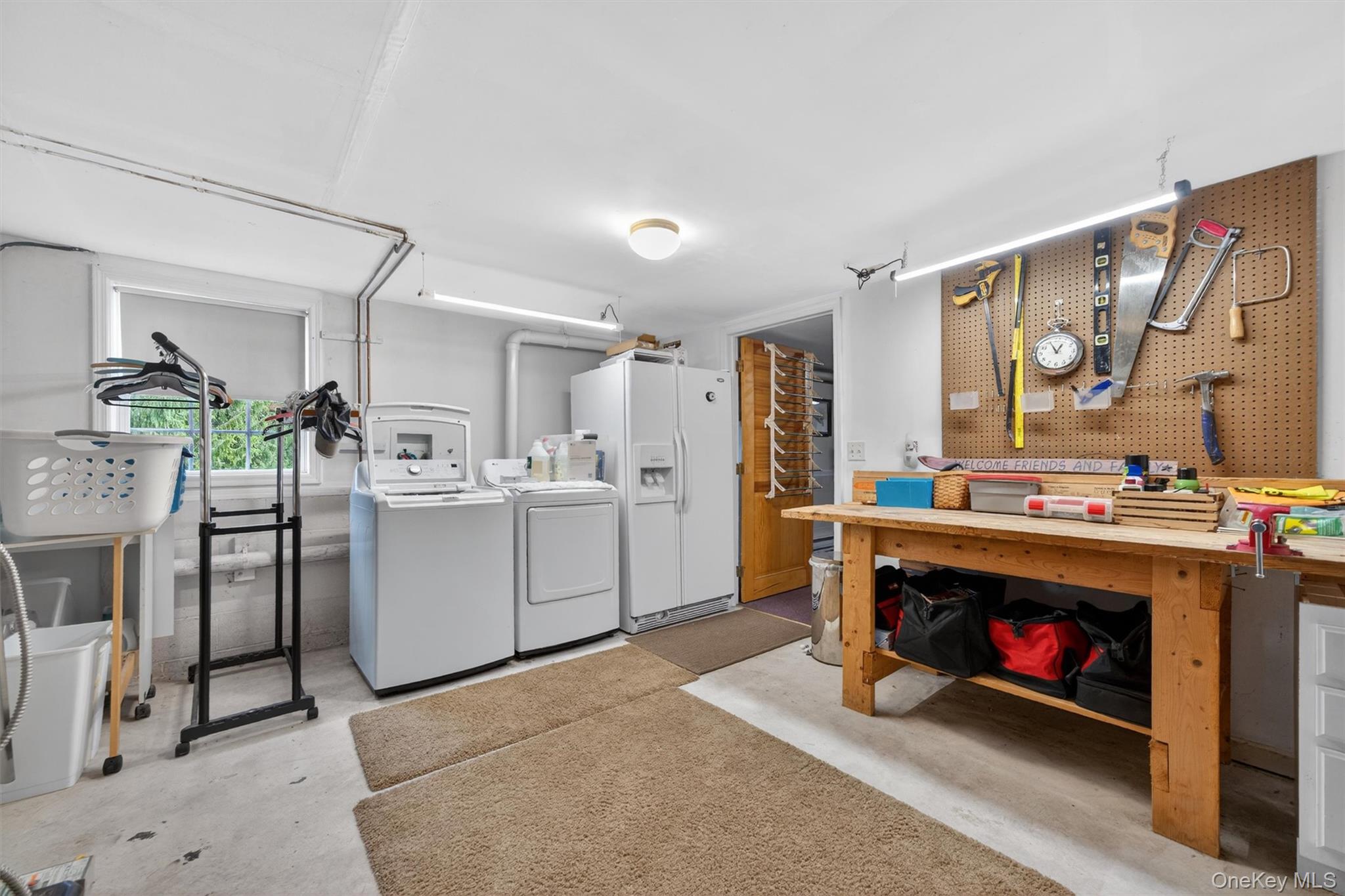139 Clark Road Goshen, NY 10924 - Photo 28 of 39 In basement with work bench
