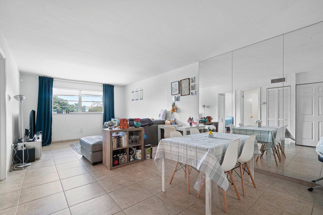 600 Southwest 2nd Street, Unit 2390 Boca Raton, FL 33486 - Photo 6 of 18 a view of a dining room with furniture window and outside view