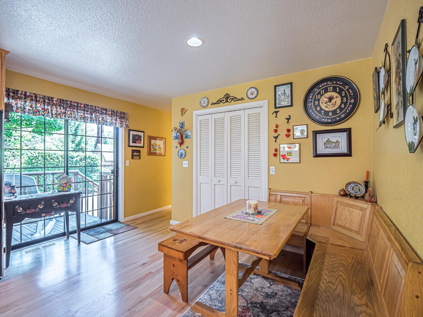394 Hames Road Corralitos, CA 95076 - Photo 12 of 39 a room with a table and a bookshelf