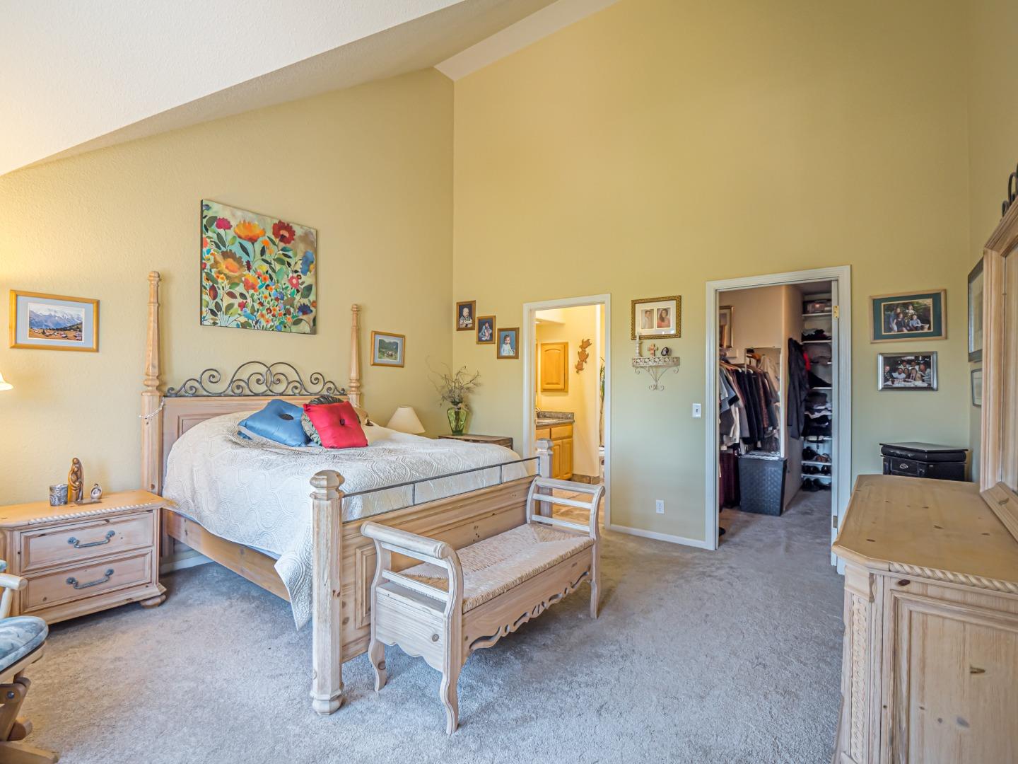 394 Hames Road Corralitos, CA 95076 - Photo 16 of 39 a bedroom with a bed and a table