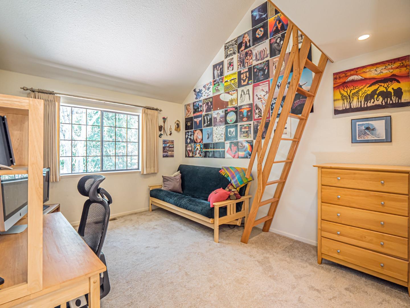 394 Hames Road Corralitos, CA 95076 - Photo 21 of 39 a bedroom with furniture and a window