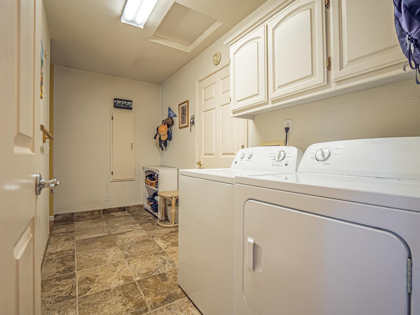 394 Hames Road Corralitos, CA 95076 - Photo 25 of 39 a utility room with dryer and washer