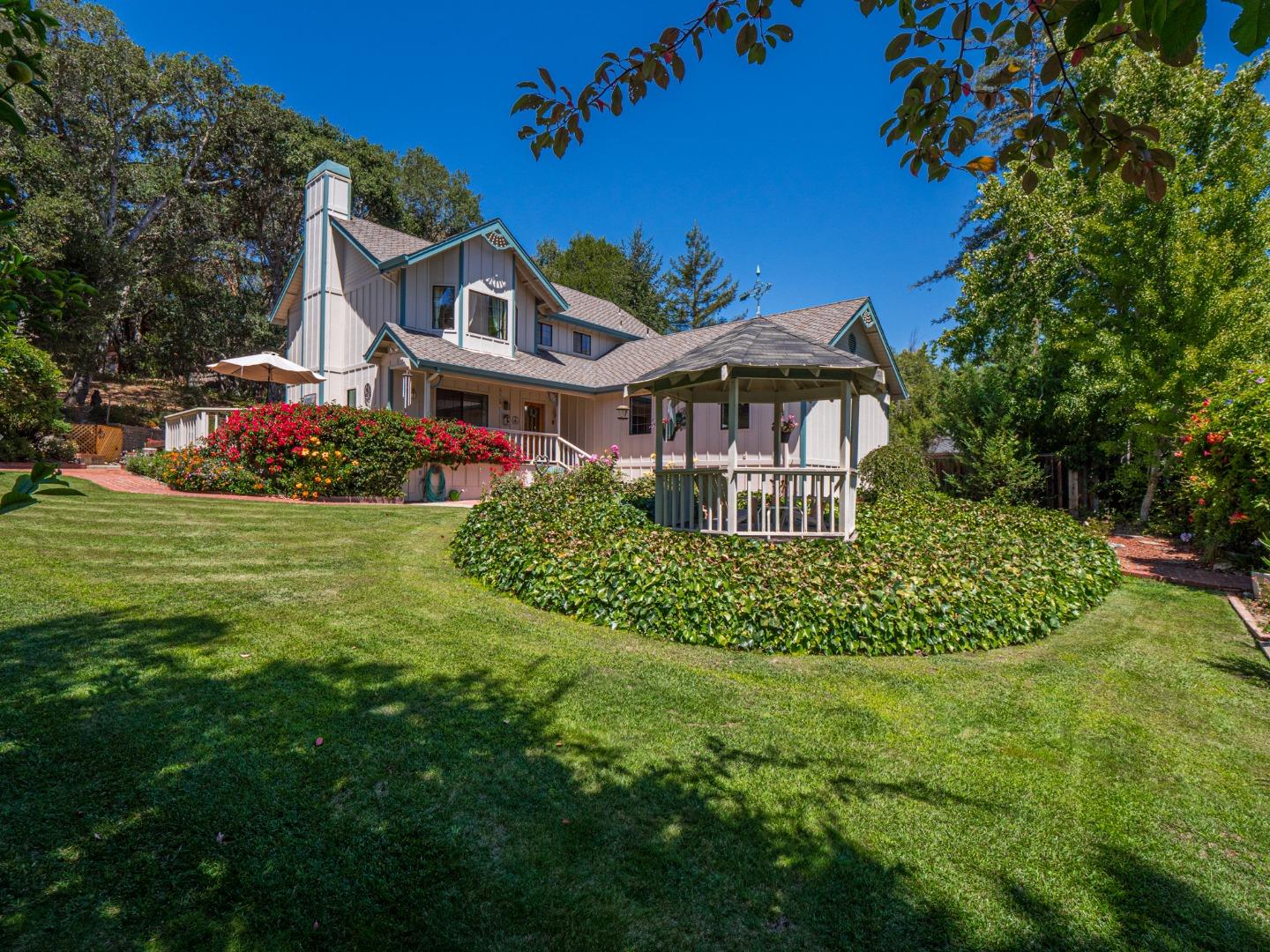 394 Hames Road Corralitos, CA 95076 - Photo 26 of 39 a front view of a house with garden