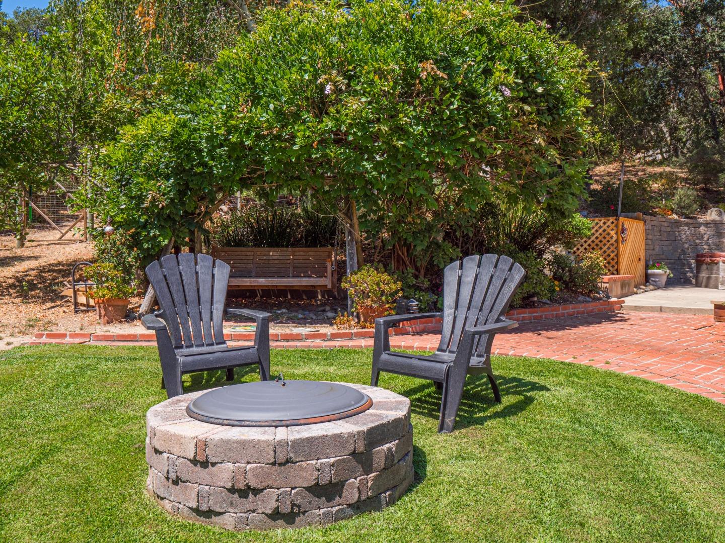 394 Hames Road Corralitos, CA 95076 - Photo 29 of 39 a building view with a sitting space and garden