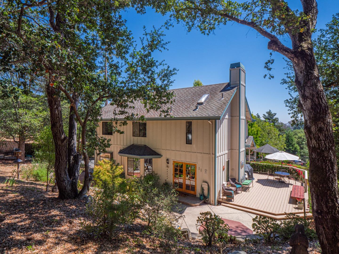 394 Hames Road Corralitos, CA 95076 - Photo 4 of 39 an aerial view of a house with garden space and balcony