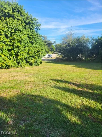 a view of an ocean and a mountain
