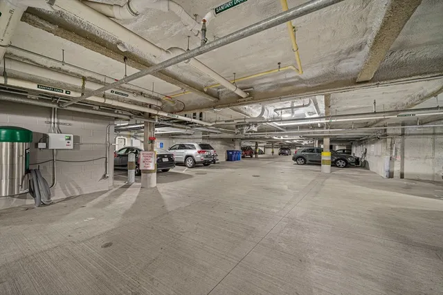 a view of parking garage with lots of space