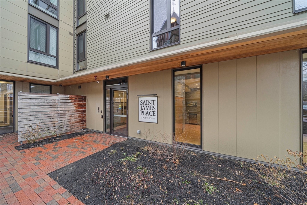 7 Beech Street, Unit 319 Cambridge, MA 02140 - Photo 23 of 27 a view of a house with a door
