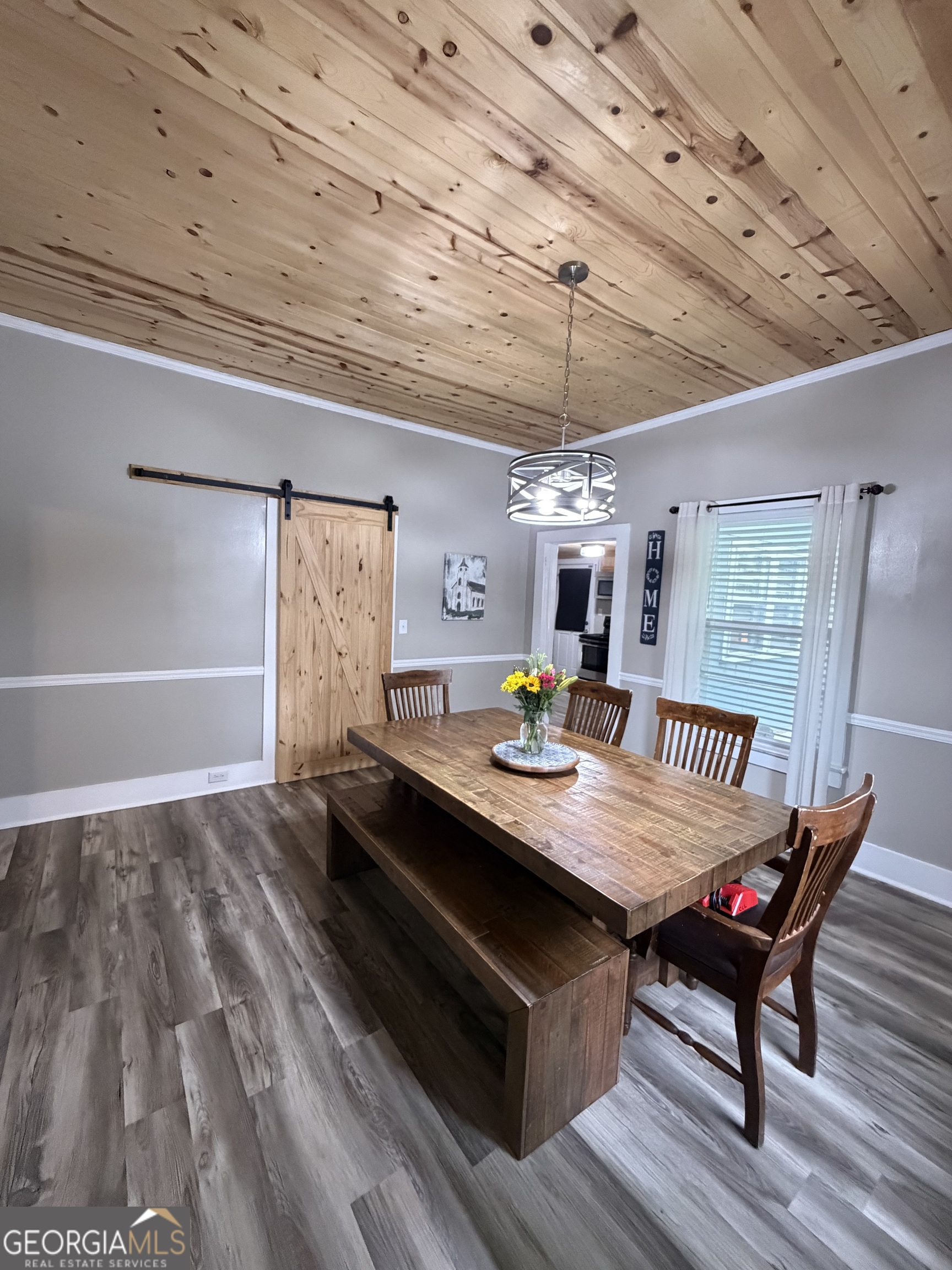 416 Bailey Street Valley, AL 36854 - Photo 17 of 24 a view of a dining room with furniture window and wooden floor