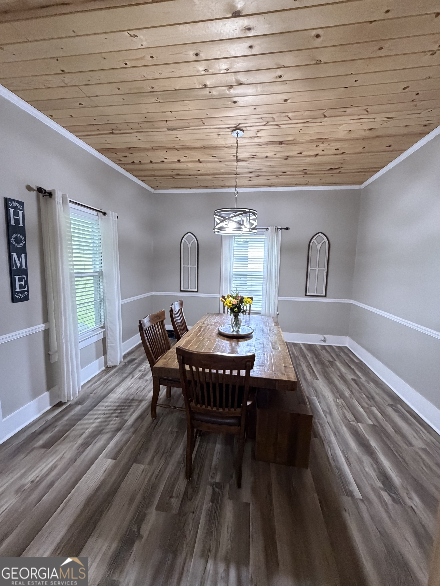 416 Bailey Street Valley, AL 36854 - Photo 19 of 24 a view of a dining room with furniture and wooden floor