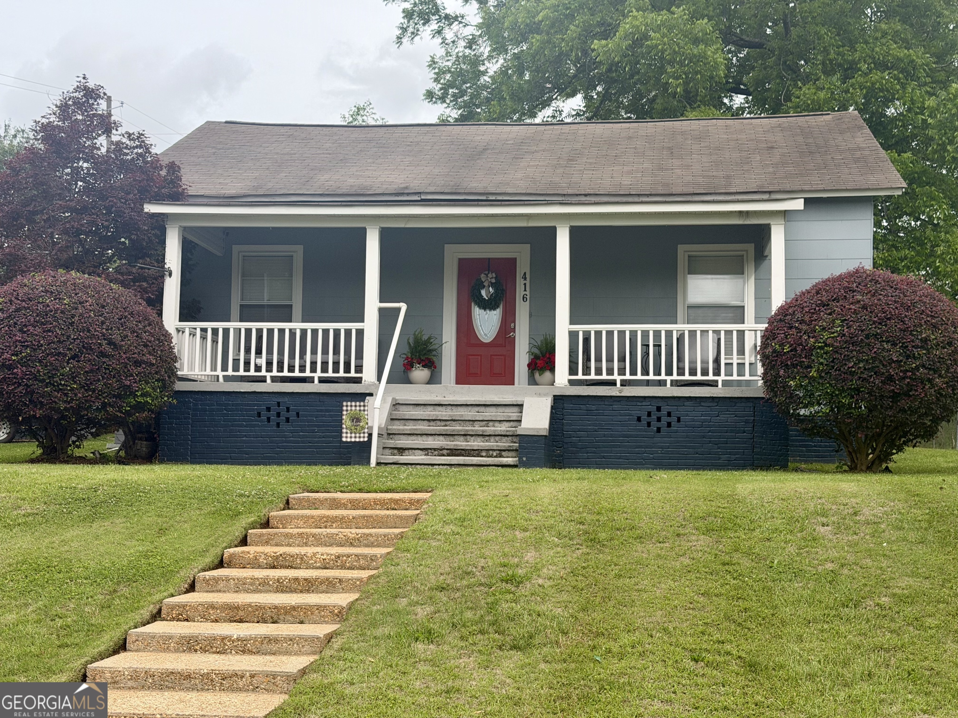 416 Bailey Street Valley, AL 36854 - Photo 2 of 24 a front view of a house with garden