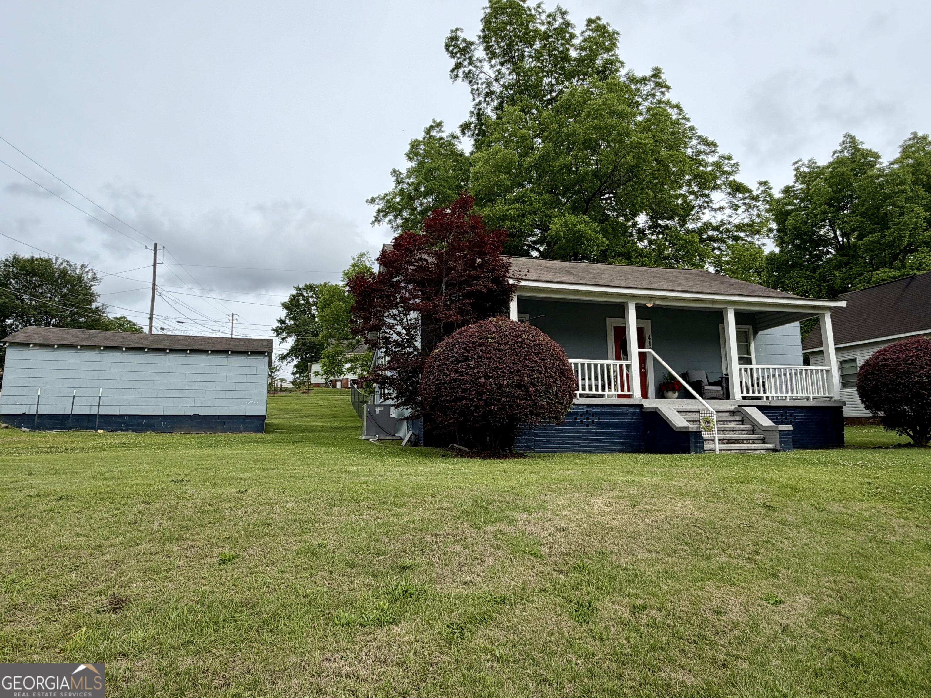 416 Bailey Street Valley, AL 36854 - Photo 3 of 24 a view of a house with backyard and porch