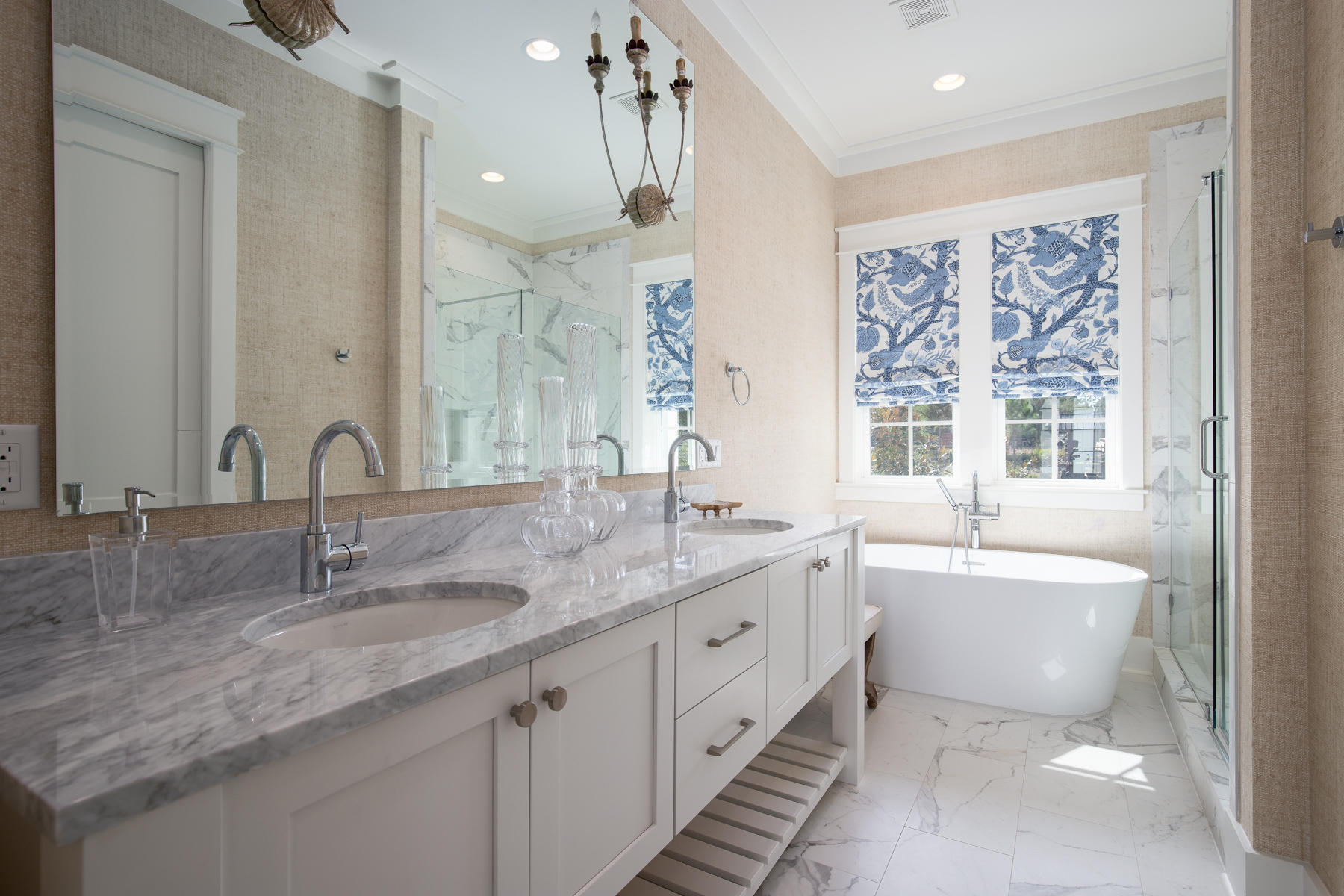 46 Catface Dr Inlet Beach, Unit LOT 178 Inlet Beach, FL 32461 - Photo 6 of 19 a bathroom with double vanity sink a mirror and a bathtub