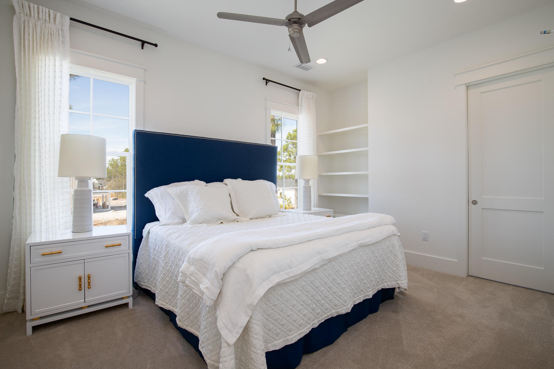 46 Catface Dr Inlet Beach, Unit LOT 178 Inlet Beach, FL 32461 - Photo 8 of 19 a bed room with a bed and a window