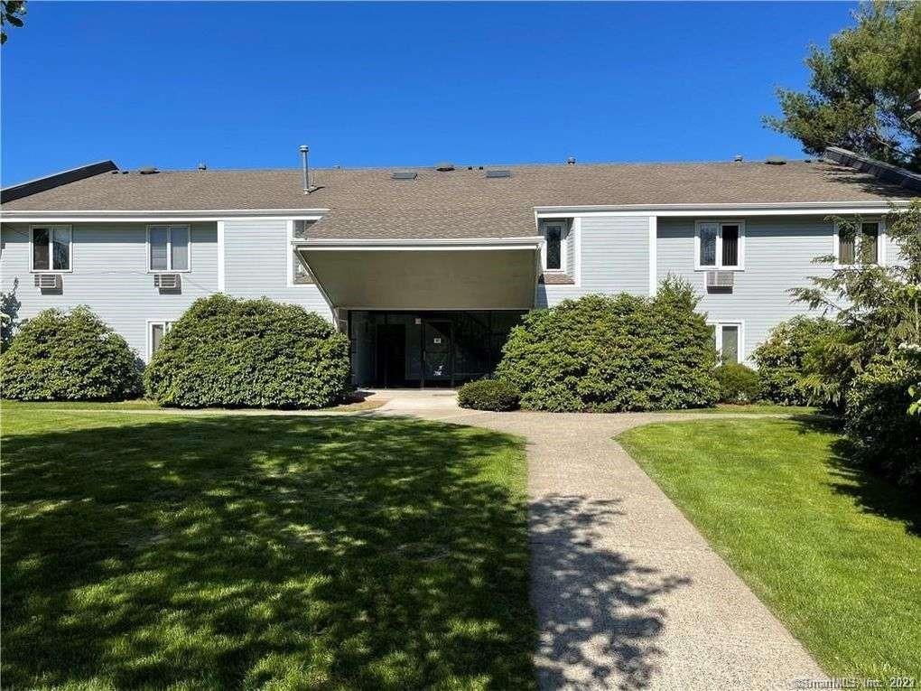 117 Florence Road, Unit 2B Branford, CT 06405 - Photo 1 of 1 a front view of a house with a garden