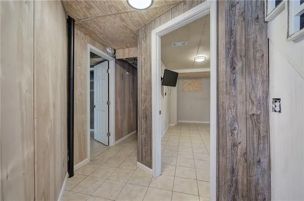 a view of a bathroom with a glass door and shower