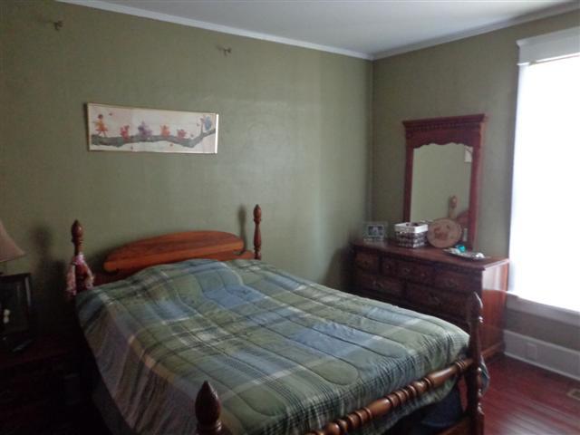109 Riverside Drive Columbia, TN 38401 - Photo 12 of 20 Another shot of the second bedroom. Another large window and those beautiful floors are in here as well.