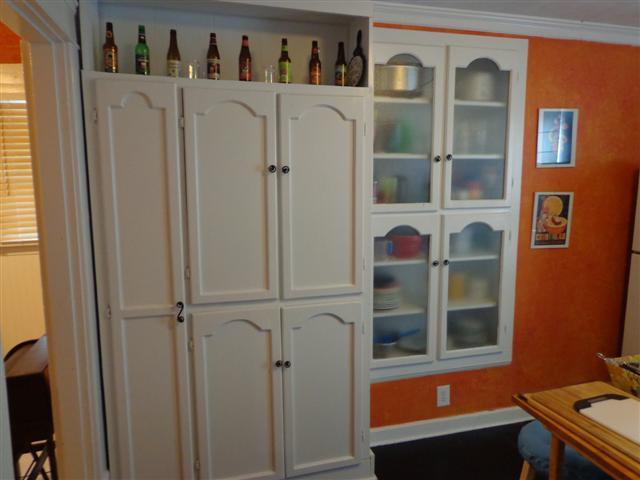 109 Riverside Drive Columbia, TN 38401 - Photo 17 of 20 Unique kitchen features include a recessed shelving unit plus a custom pantry cabinet.