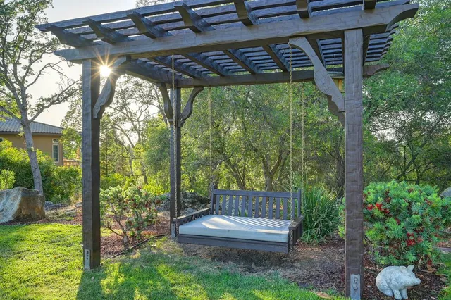 a garden view with a seating space