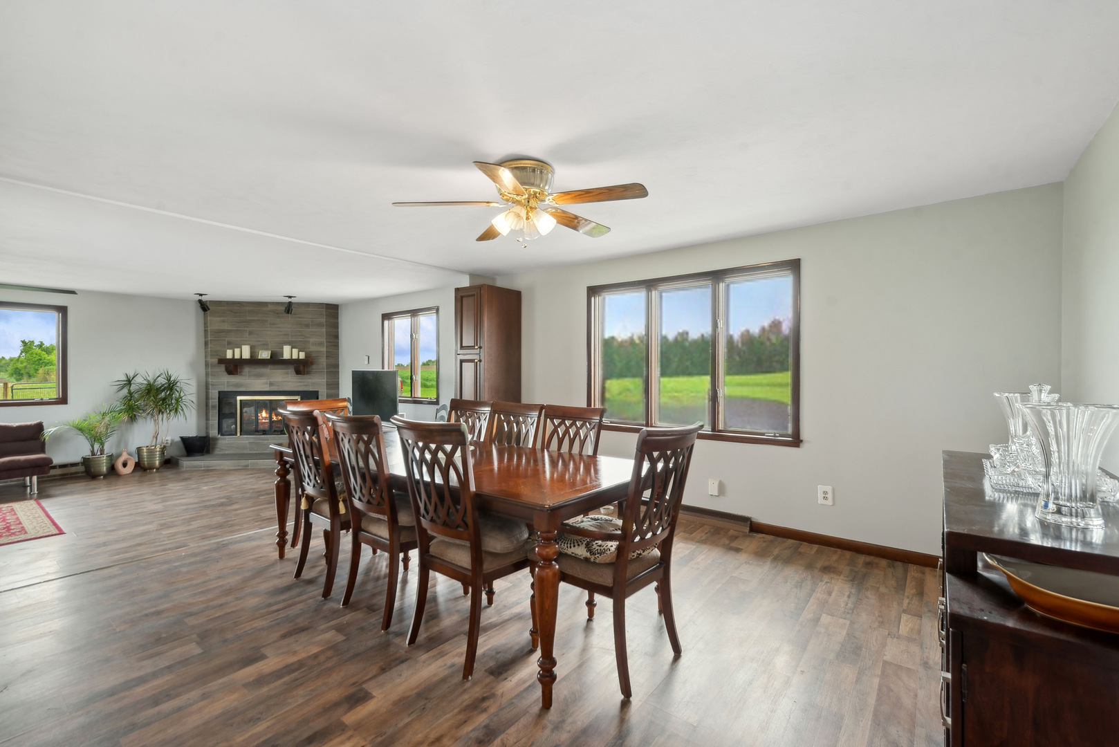 11719 Engelhardt Road Harvard, IL 60033 - Photo 6 of 18 a view of a dining room with furniture window and wooden floor