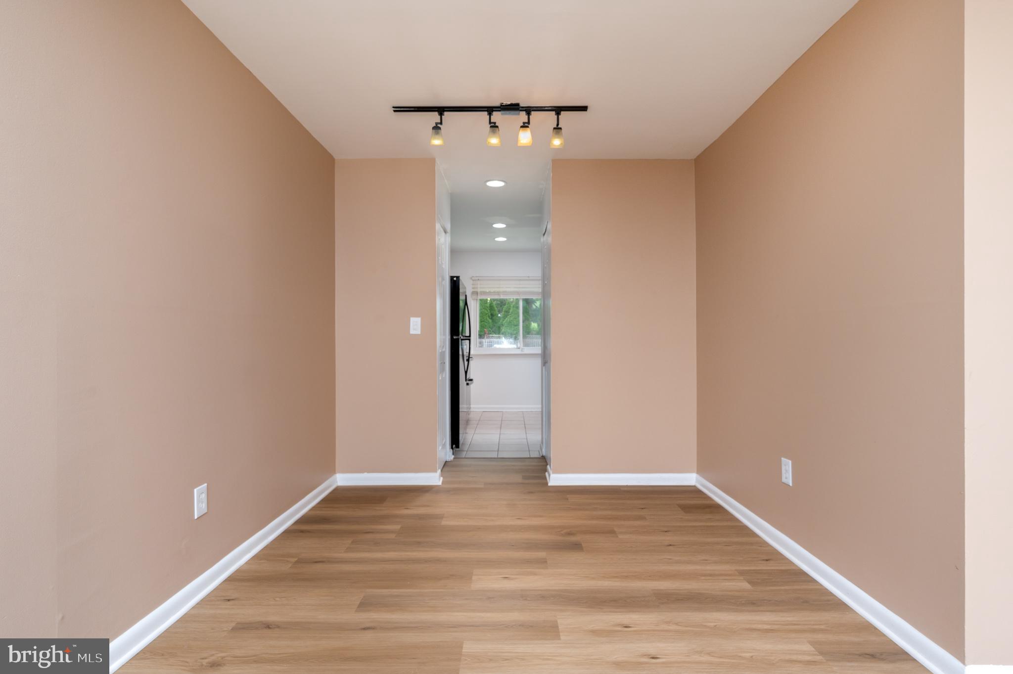 1008 Cedar Ridge Court Annapolis, MD 21403 - Photo 15 of 32 Dining room w/ new LVP flooring