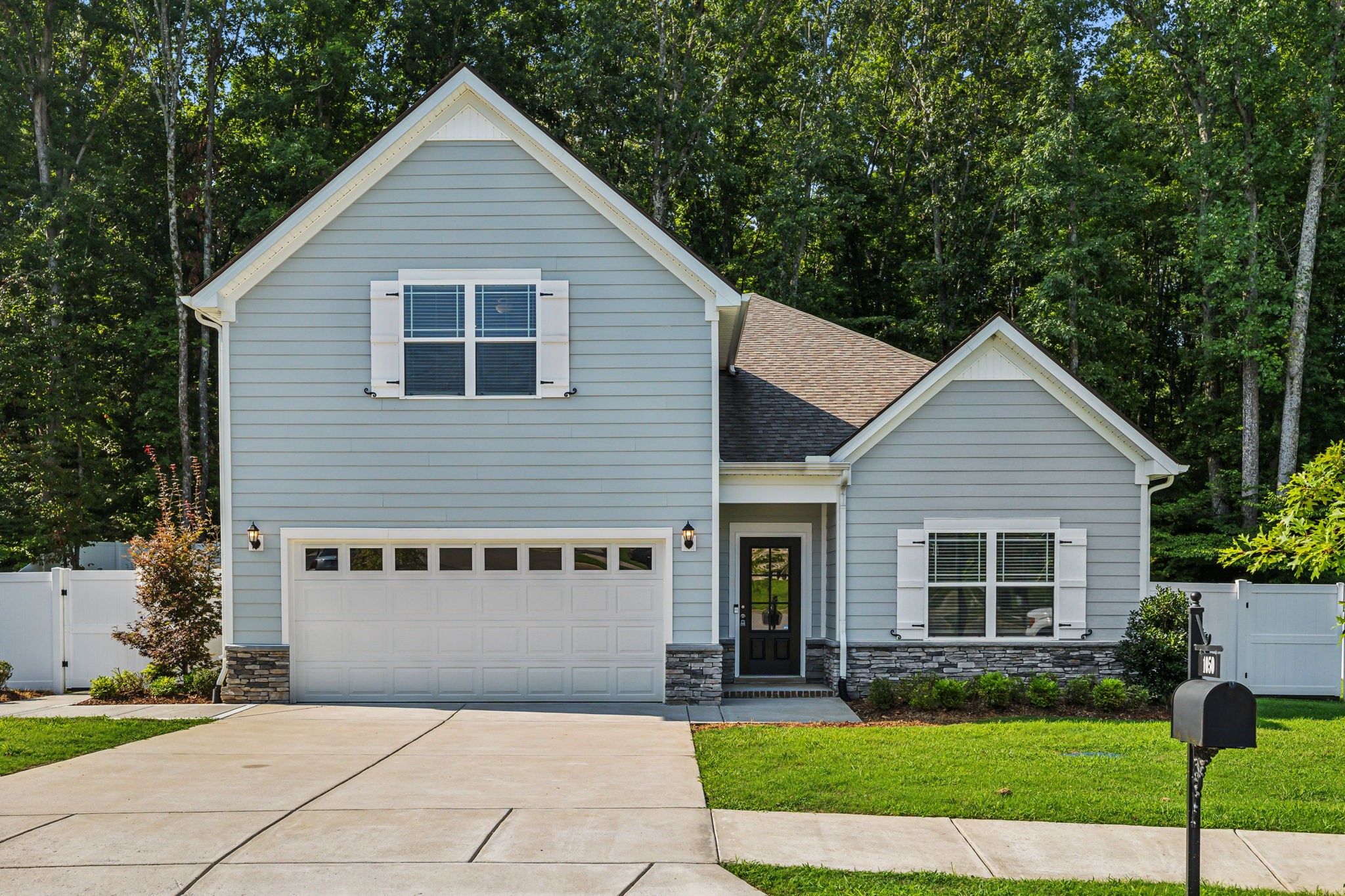 1050 Wiseman Farm Road Fairview, TN 37062 - Photo 3 of 46 a front view of house with yard and green space