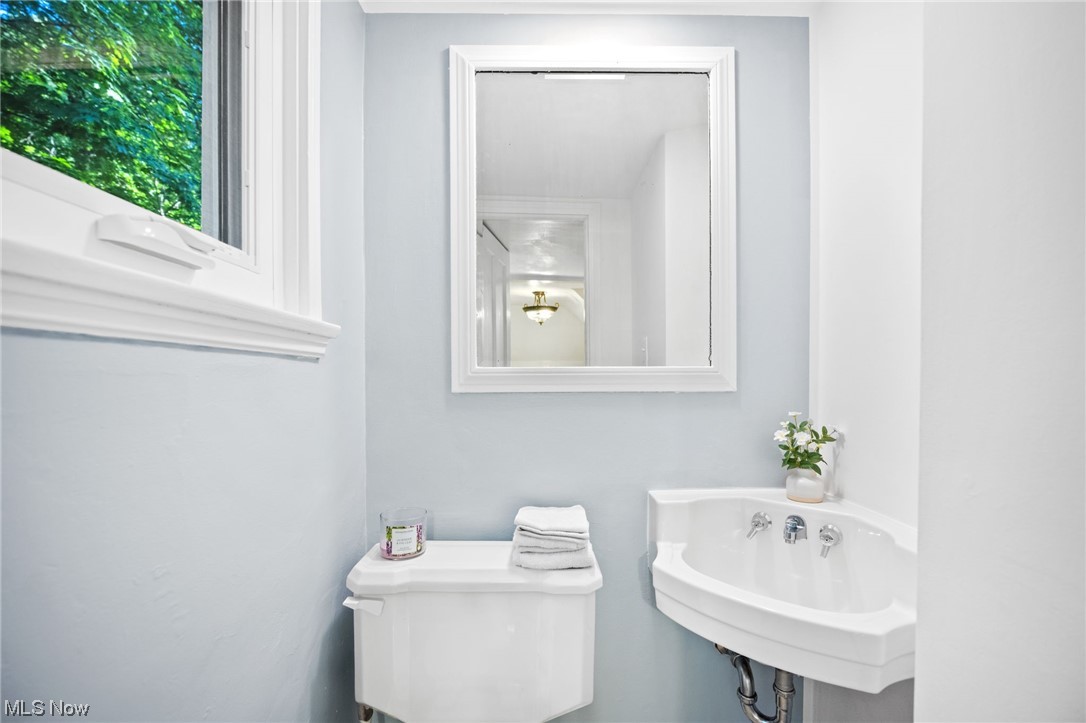 3962 Orchard Road Cleveland Heights, OH 44121 - Photo 18 of 35 Bathroom featuring mirror and sink