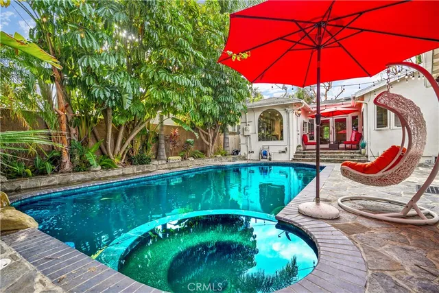 a view of a swimming pool with a patio