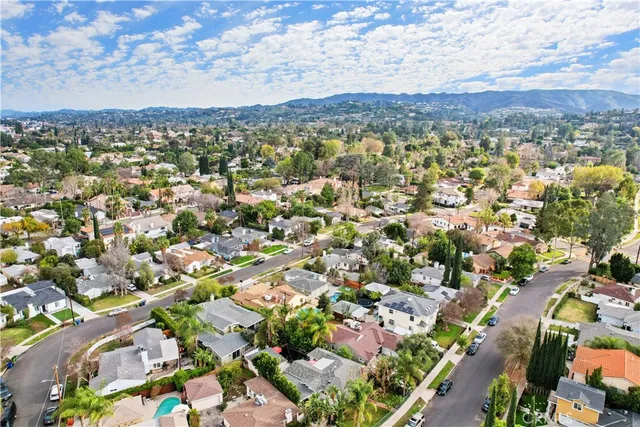 an aerial view of a city with lots of residential buildings