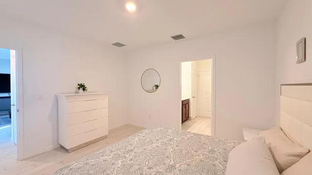 a view of a closet in kitchen