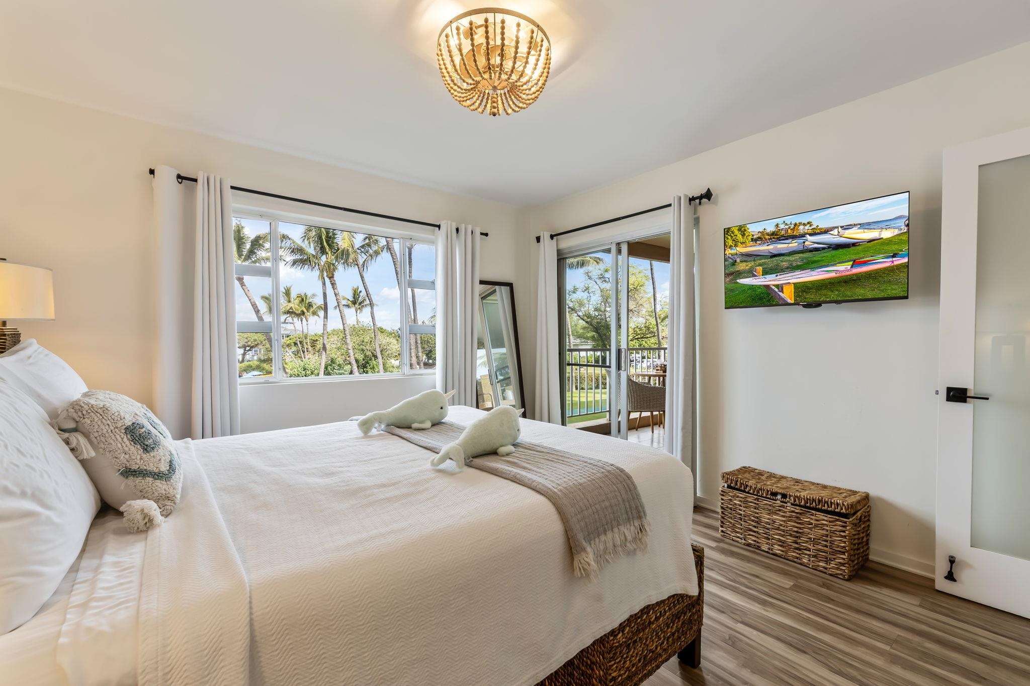 760 South Kihei Road, Unit 208 Kihei, HI 96753 - Photo 22 of 30 a bedroom with a bed and a window